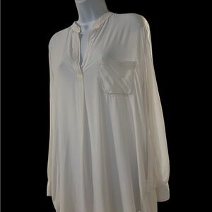 Victoria’s Secret white V-neck, long sleeve pullover with 2 pockets size XS.